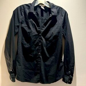 V-neck, Black, long sleeve, button-up, fitted.